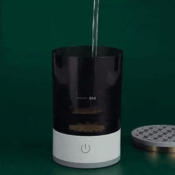 Automatic brush cleaner